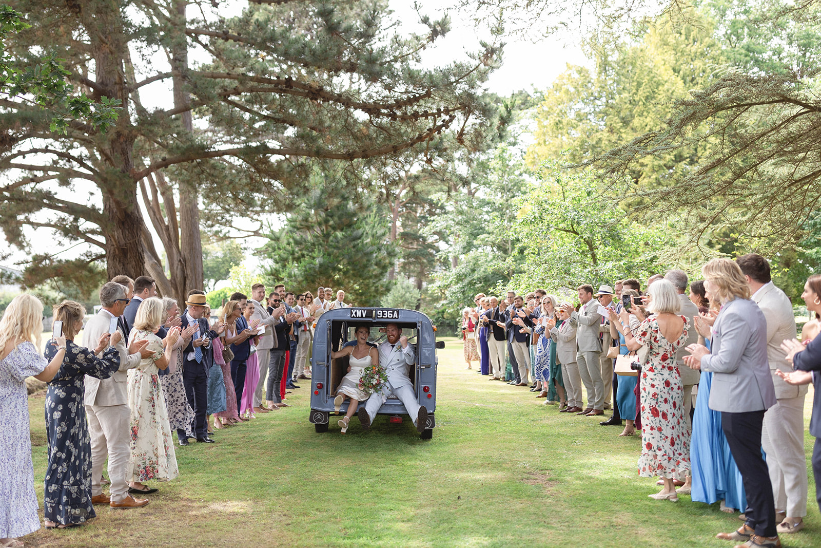 Wedding guests gathered outside Studland Bay House